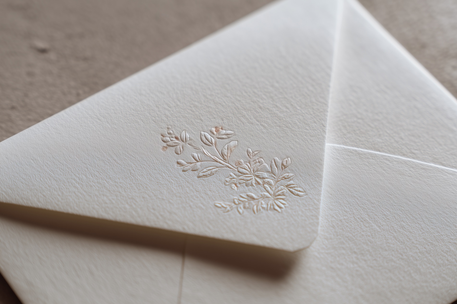 alinas98_Close-up_of_a_handmade_ivory_envelope_with_delicate_fl_ff48560c-420b-49c4-883b-2ca69405a296 2